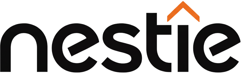 Nestie logo featuring the brand name in black with an orange accent above the letter "i."